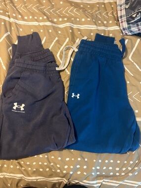 2 pair Women’s Under Armour purple and blue Joggers